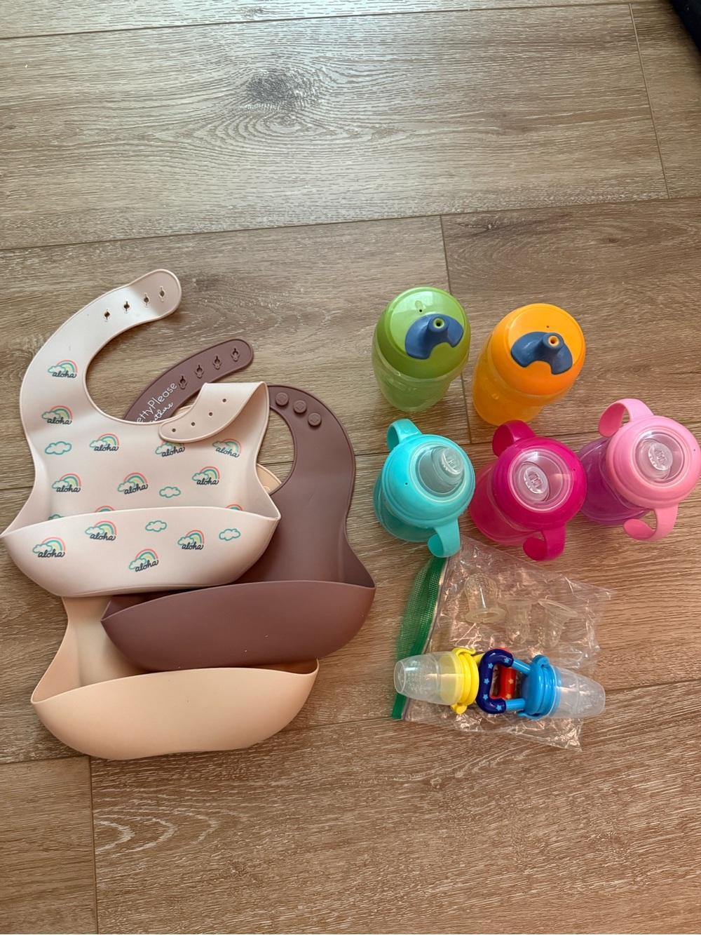 10 item baby bundle 3 Bibs, 5 Spill-Proof Sippy Cups, 2 teething pacifiers
